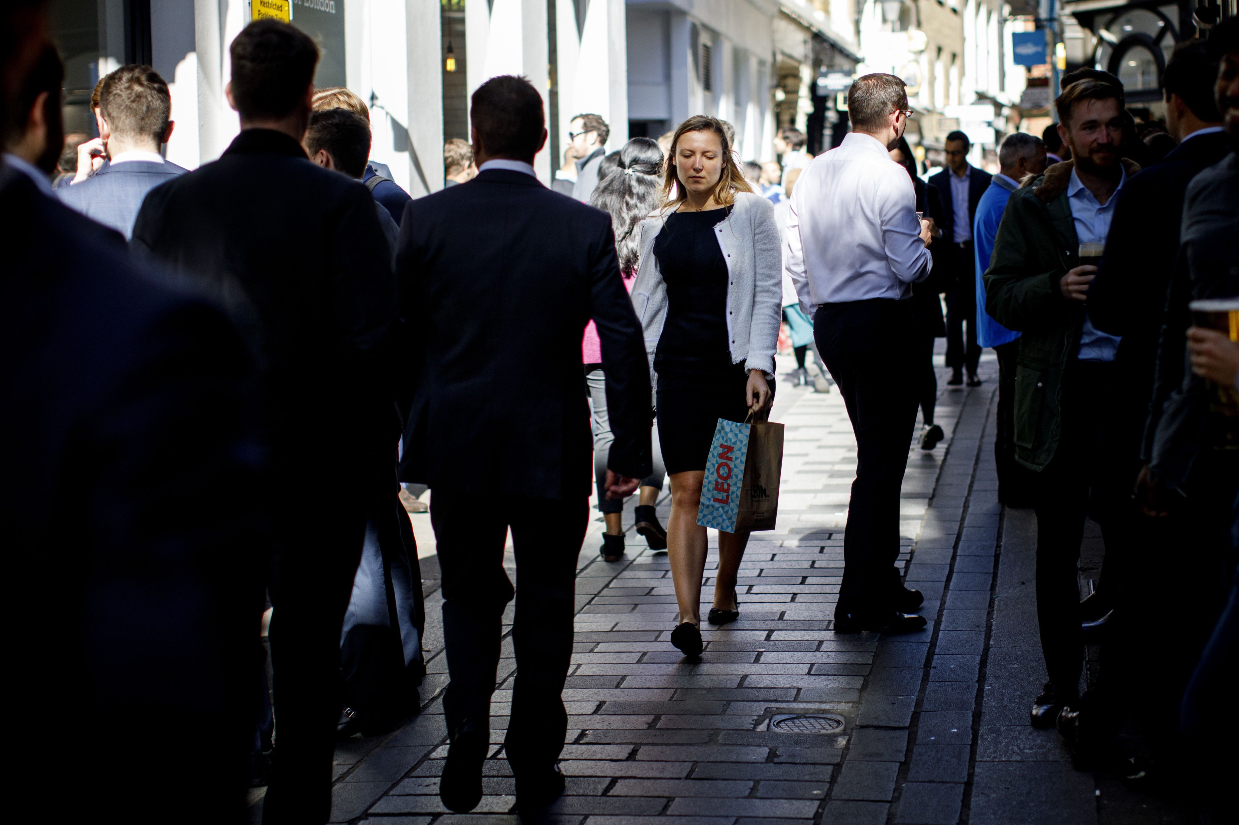 City workers at outside at lunchtime